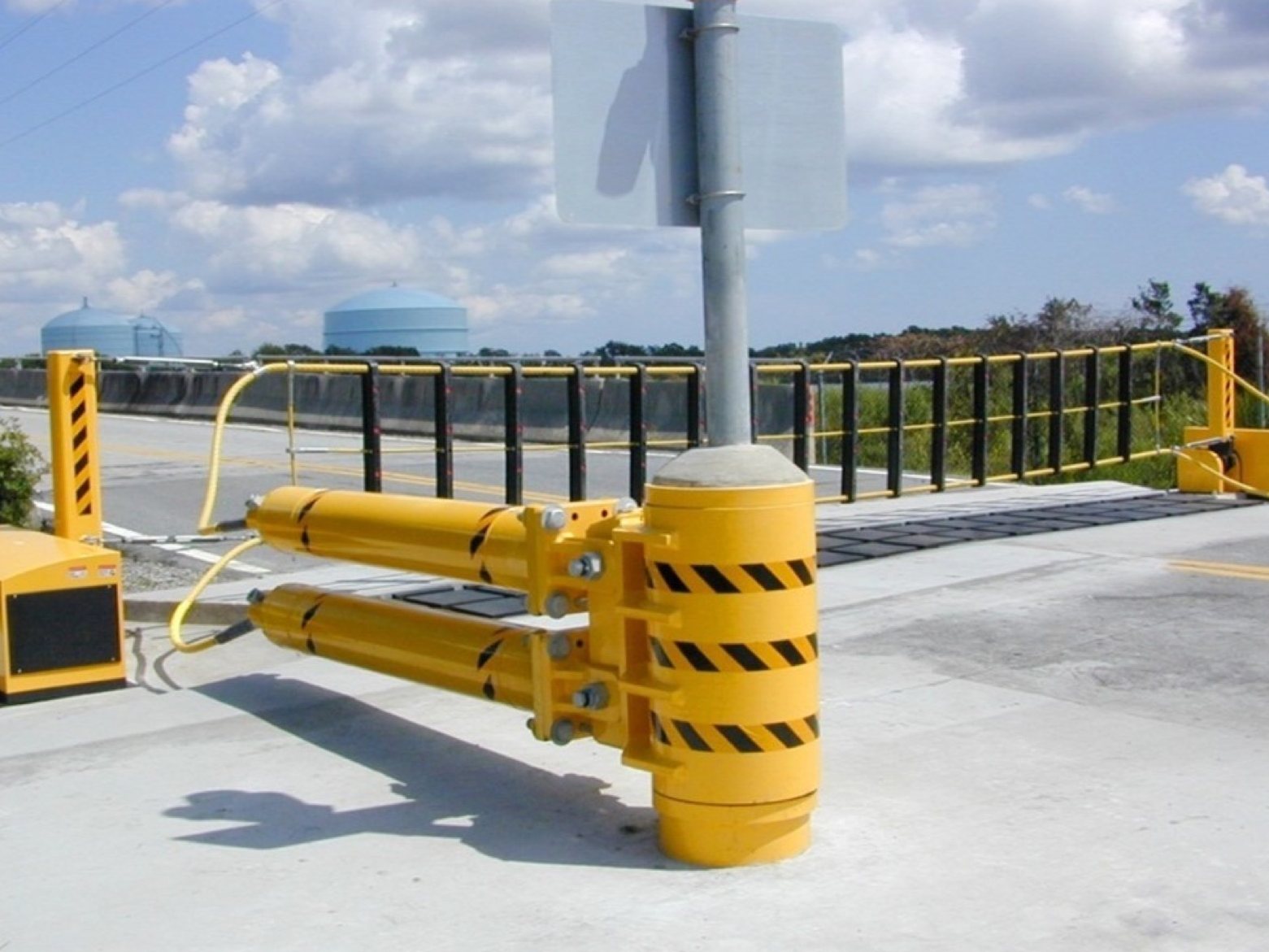 Active wedge barrier deployed across a roadway